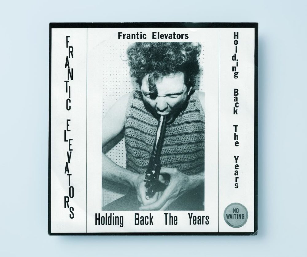 Frantic Elevators - Holding Back The Years (front cover)